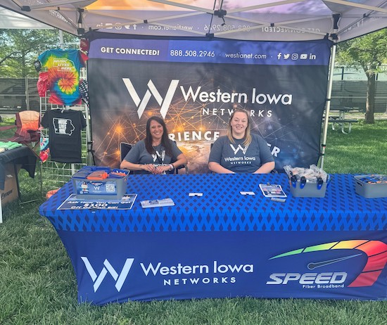 Picture of the WIN booth at the Concert - Download Images to View